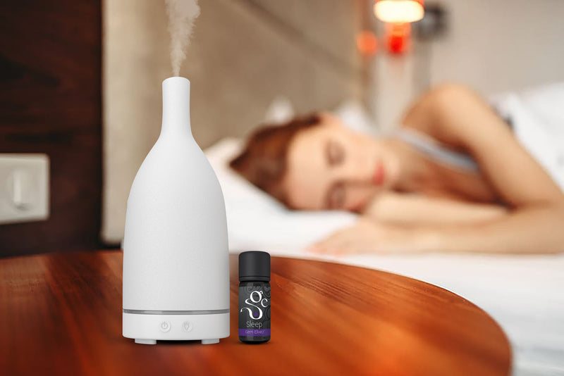 white stone diffuser and Sleep aromatherapy diffuser blend with essential oils and gemstones