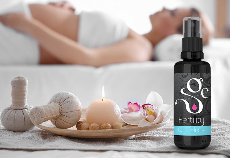 Fertility aromatherapy spray with essential oils and gemstones